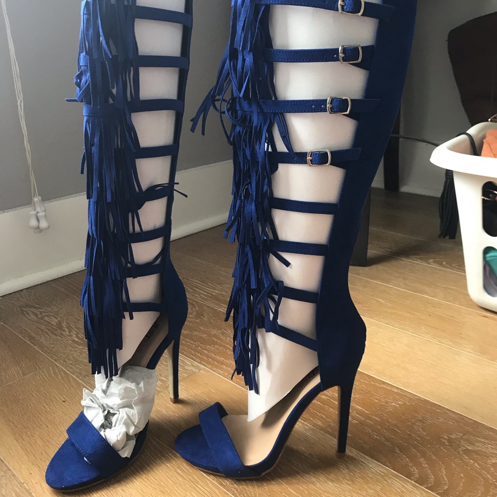 Fringed tall sandals. Never opened. New in Box